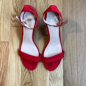 Open toe sued red heels